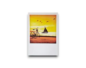 Ansichtkaart - Fiets en zeilboot in avondrood